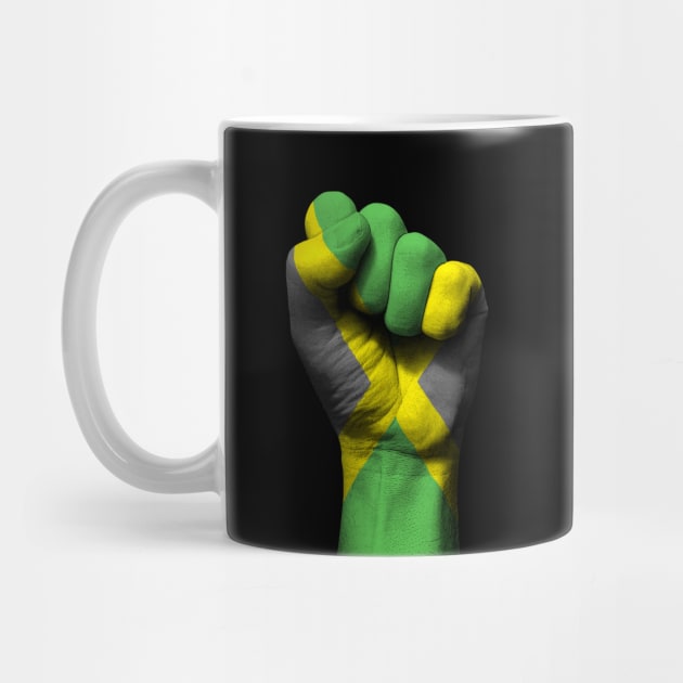 Flag of Jamaica on a Raised Clenched Fist by jeffbartels